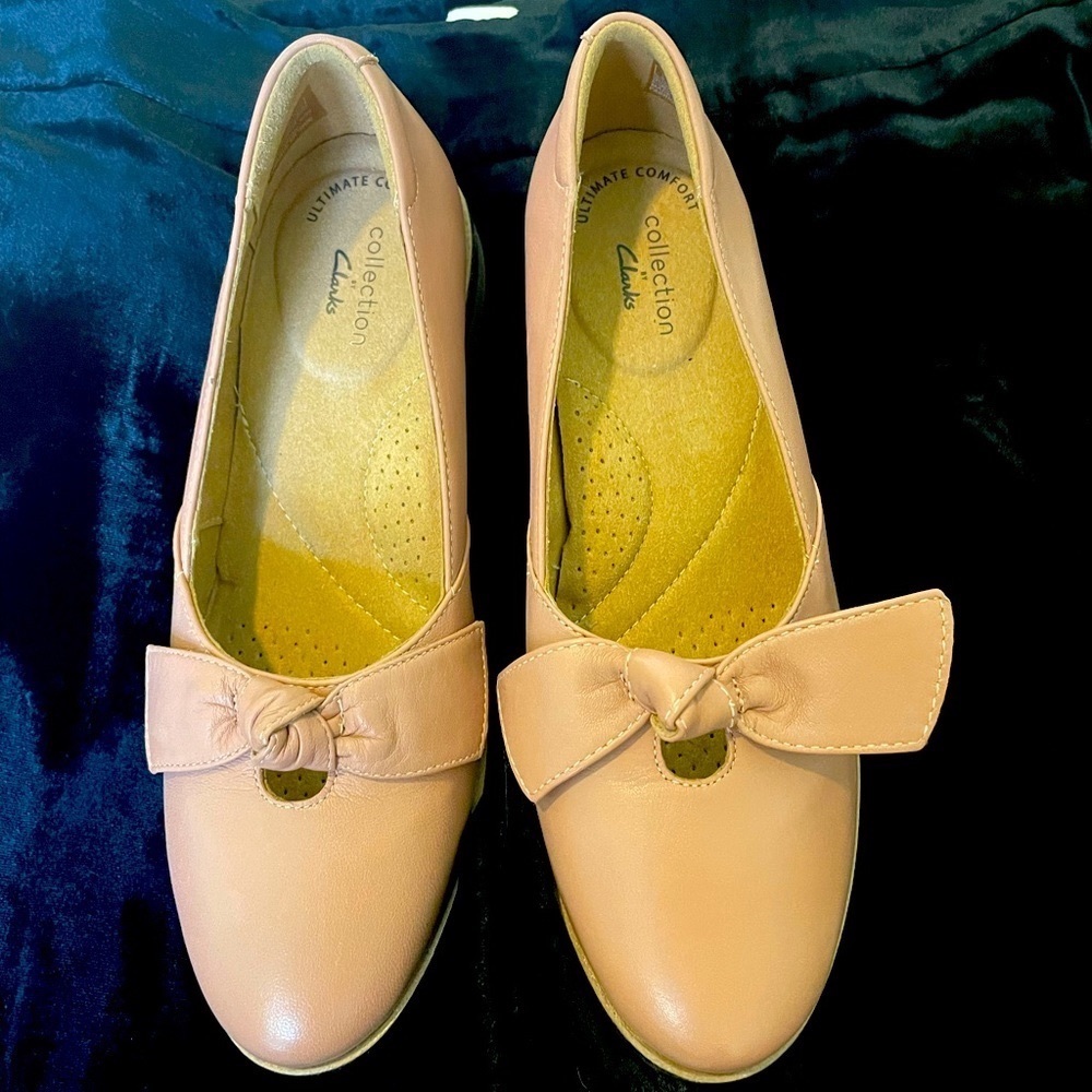 Clark’s rose leather flats.